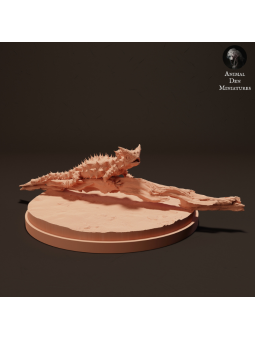 Thorny devil on branch