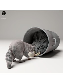 Raccoon searching through garbage