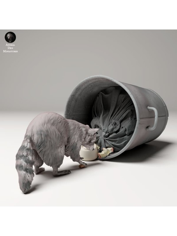 Raccoon searching through garbage