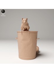 Raccoon coming out of garbage