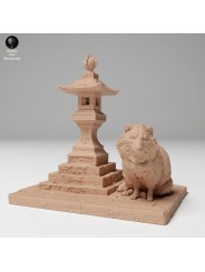 Tanuki next to pagoda lantern